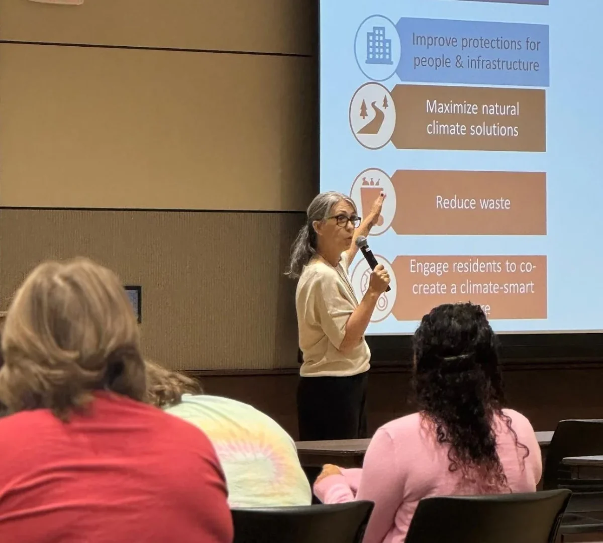  Climate solutions. At the Nebraska Youth Climate Summit on Sept. 29, state climatologist Deborah Bathke presents findings from the most recent state climate report. Jacki Petrow, who is a student at the University of Nebraska-Lincoln, attended the presentation and found hope in the report’s solutions for climate change. “Knowing that we still have these reports… and we kind of know what we need to do going into the future,” Petrow said, “that’s something that creates hope for me and hope for the state's future.” Photo by Victoria Bogatz 