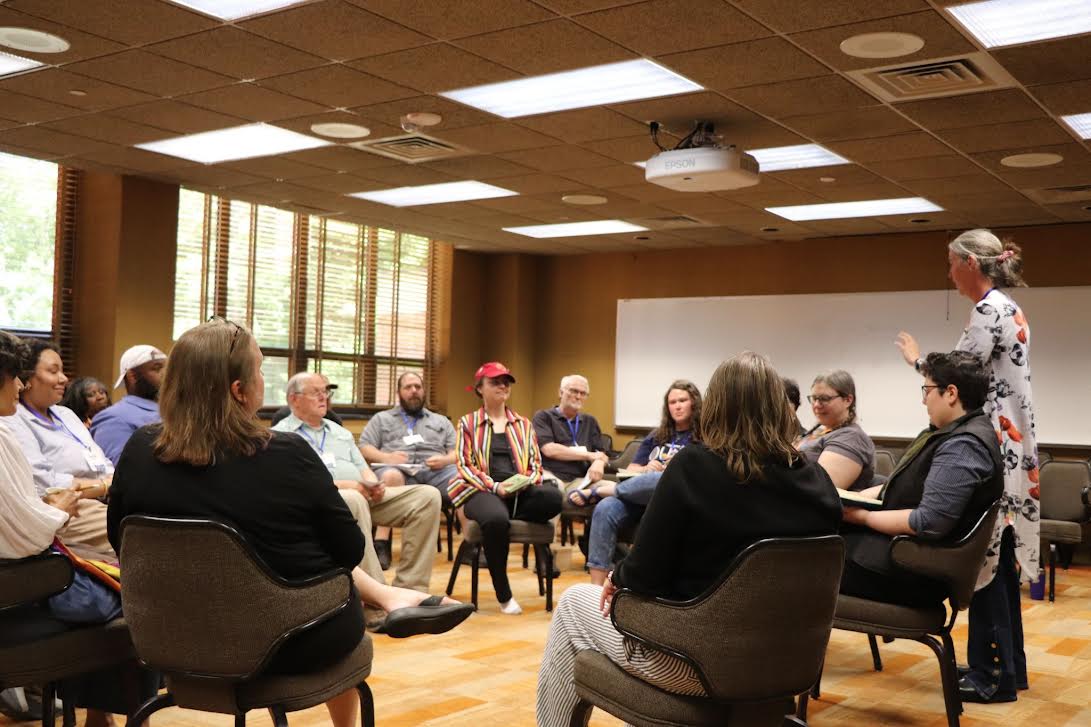 Michigan Climate Summit attendees participate in a fishbowl-style conversation