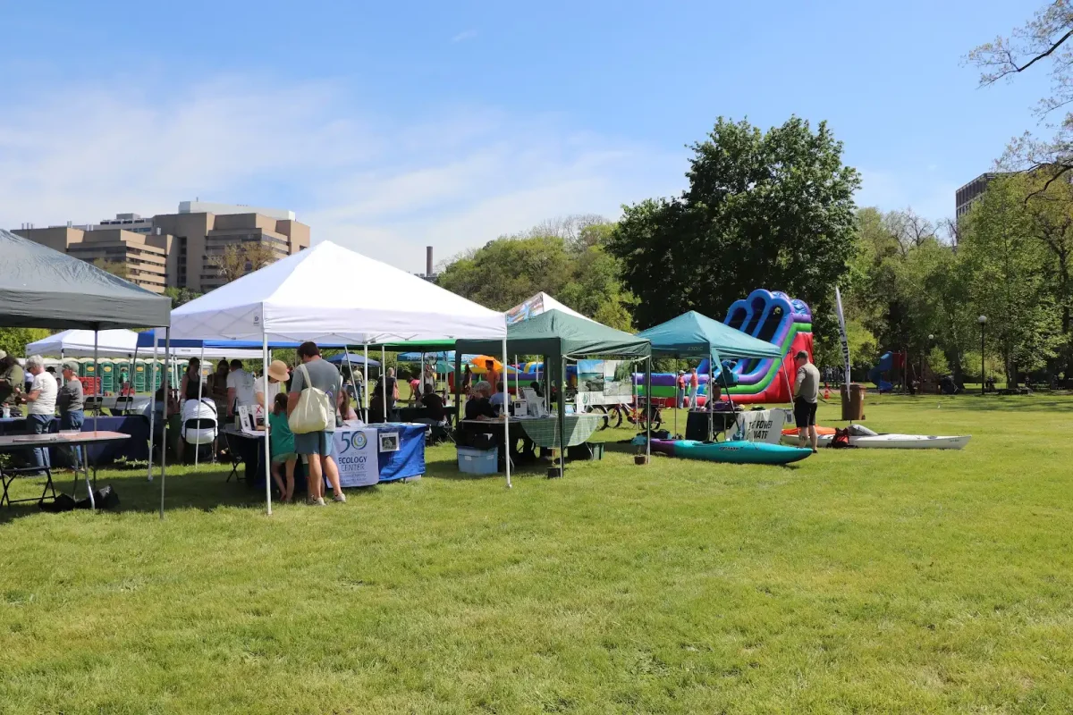 Huron River Day tents bustle with activity
