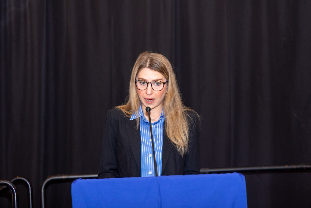 At the 2026 Michigan Climate Summit, policy expert Francesca Reznik argues that decentralized clean energy is a vital defense against national security threats.